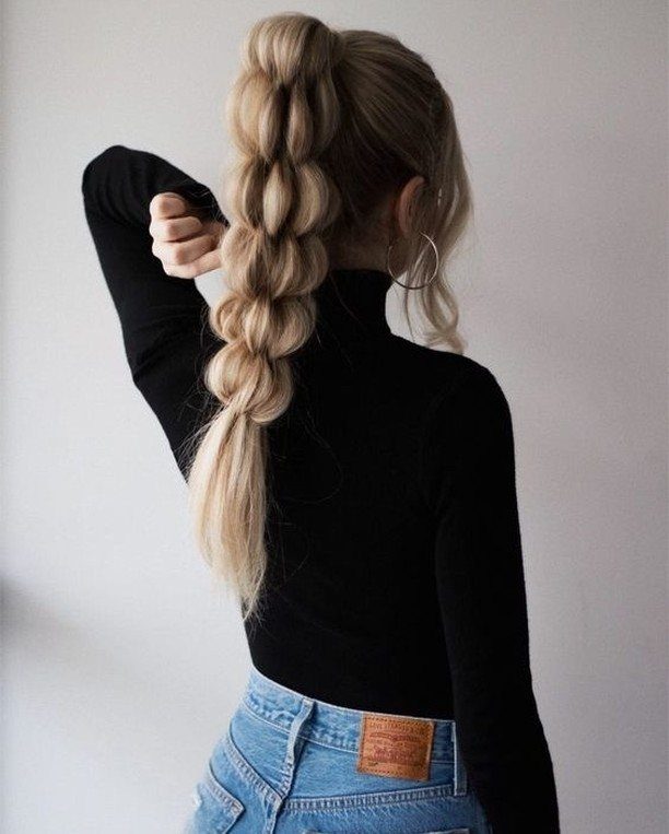 Blonde bubble ponytail with rounded sections shown from behind